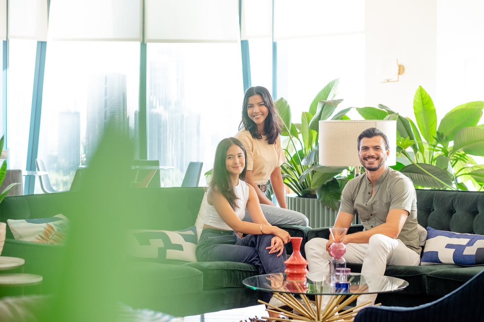 Group of Colleagues Hanging Out in a Modern Workspace